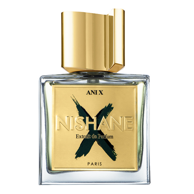 A bottle of Ani X Nishane fragrance with a gold-colored cap and a label featuring the brand name and the word 'Extrait de Parfum'.