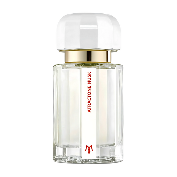 Atractone Musk Ramon Monegal Clear perfume bottle with gold cap and red text on a white background