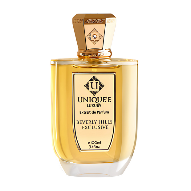Beverly Hills Exclusive A bottle of Beverly Hills Exclusive perfume with a gold label and a golden cap, under the brand Unique'e Luxury.