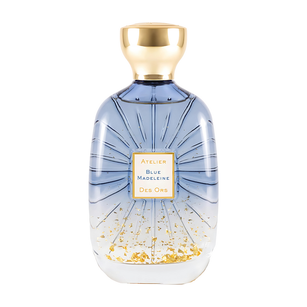 Blue Madeleine Perfume bottle with gold cap and decorative label on a white background