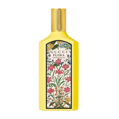 A yellow bottle of Gucci Flora Gorgeous Orchid perfume with a floral design on the label.