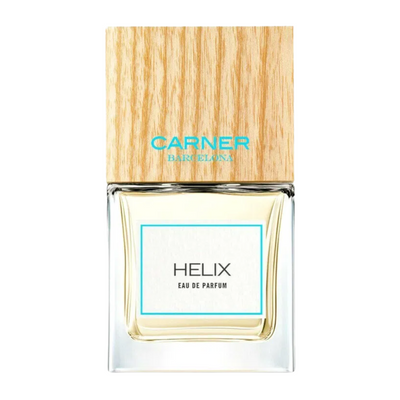 A bottle of Helix Carner Barcelona perfume with a clear glass body and a wooden cap, labeled with the brand and product name.