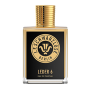 Eau de parfum bottle with a black label featuring gold text and the logo of J.F. Schwarzlose Berlin, labelled 'Leder 6'.