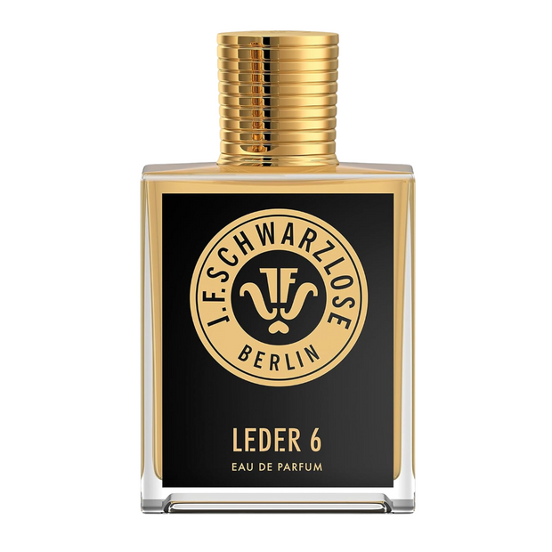 Eau de parfum bottle with a black label featuring gold text and the logo of J.F. Schwarzlose Berlin, labelled 'Leder 6'.