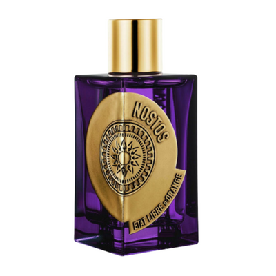 A purple bottle of Nostos Etat Libre d'Orange perfume with a gold-colored label and cap.