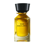 Oud Aquilaria Omanluxury perfume A bottle of Oud Aquilaria luxury fragrance with a clear yellowish liquid and a black cap.