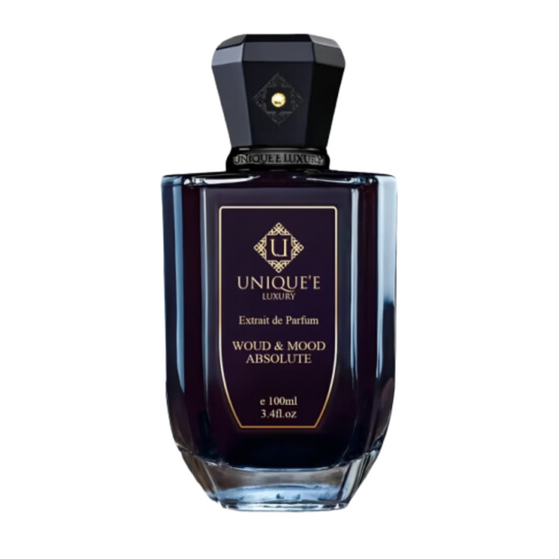 A bottle of 'Unique'f Woud & Mood Absolute Tester perfume for men and women, with a dark tinted liquid and a black label.