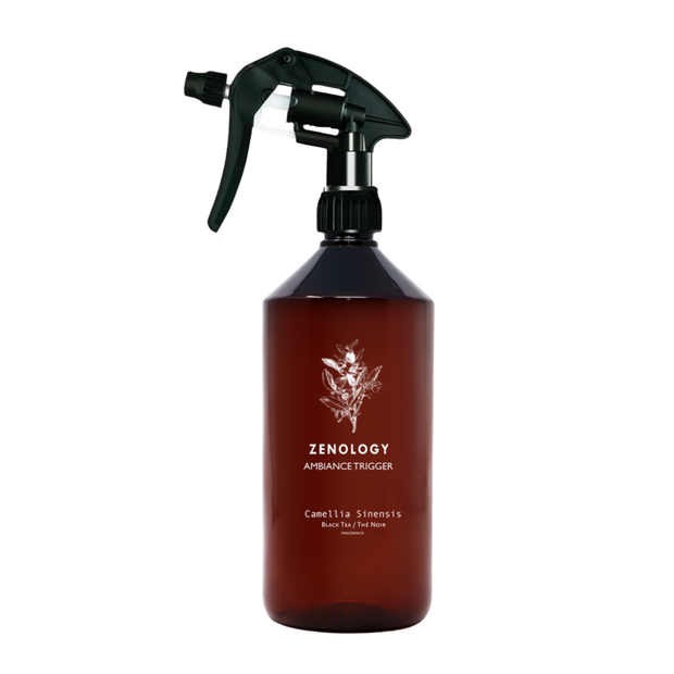 ZENOLOGY ROOM SPRAY CAMELLIA A brown room spray bottle with a label that reads 'ZENOLOGY' and 'CAMELLIA ELEGANCE'. The bottle has a spray nozzle and is shown against a white background.