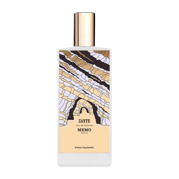 A bottle of Zante Memo Paris fragrance with a geometric pattern on the label, predominantly gold and white colors, and a gold-colored cap.